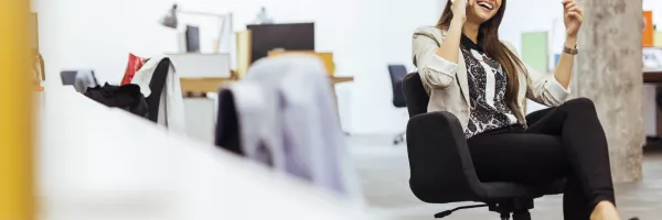 woman on phone in office