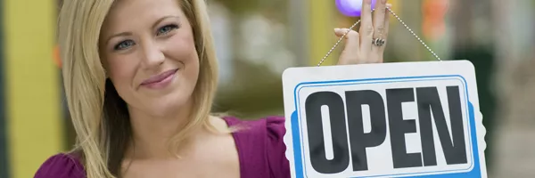 woman with open sign