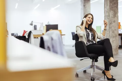 woman on phone in office