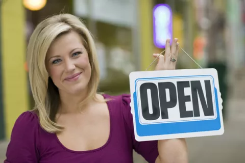 woman with open sign